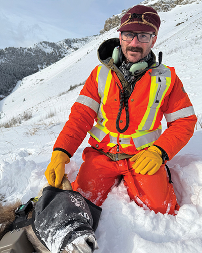WSFAB president Mike Smith, with collared wild sheep.